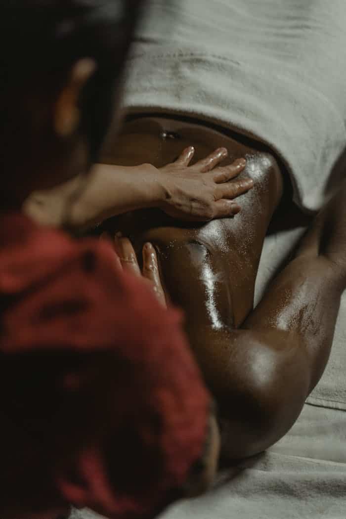 Close-up of a therapeutic massage at a spa, emphasizing relaxation and wellness.